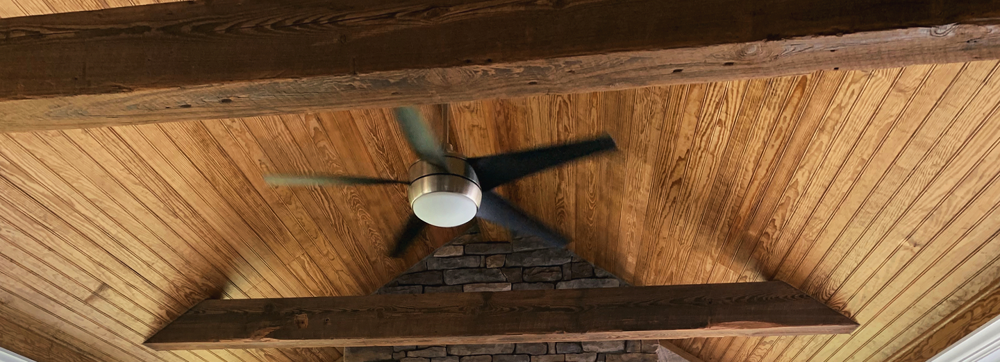 hand hewn beams in a sunroom