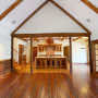 Reclaimed Wood Great Room looking into the Kitchen Rare Wood Showcase