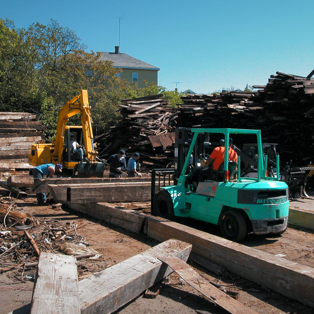 tearing down old barn with old wood